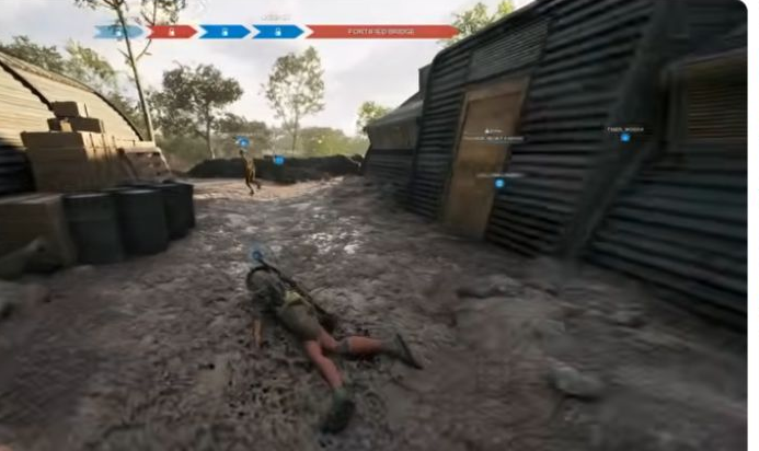 建物間の通路に味方が倒れているHLLVのゲーム画面